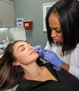 Liquivida female client gets a lip filler