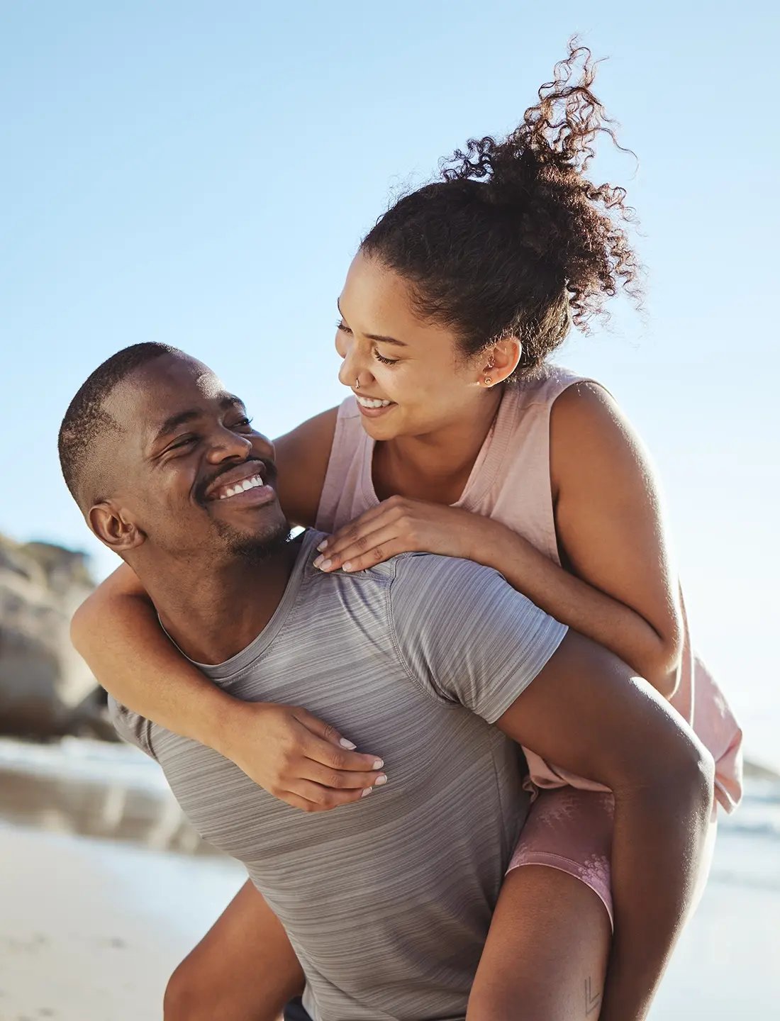 Couple enjoys a day in the beach after their sexual health check up at Liquivida Wellness Center