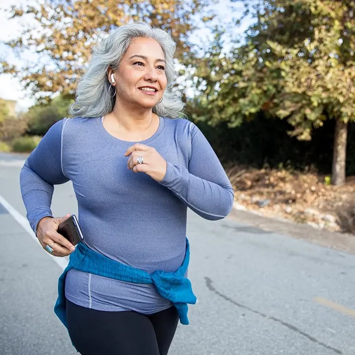 Old white woman running after a regenerative session at Liquivida Wellness Center