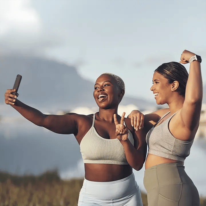 Two women take a selfie after reaching their Weight Loss goals at Liquivida Wellness Center