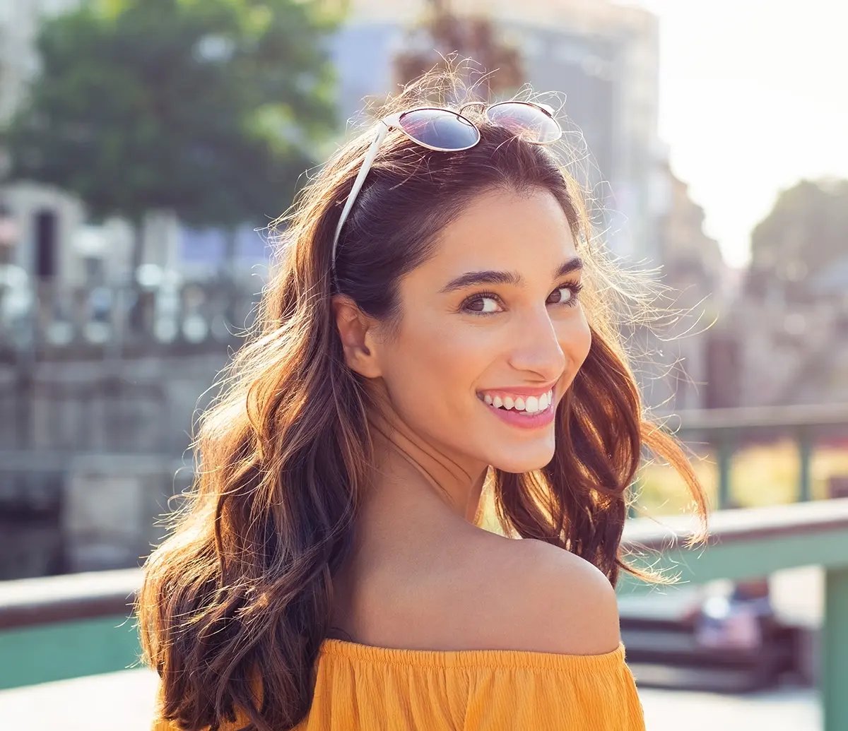 Woman smiles after her glutathione injectios at Liquivida
