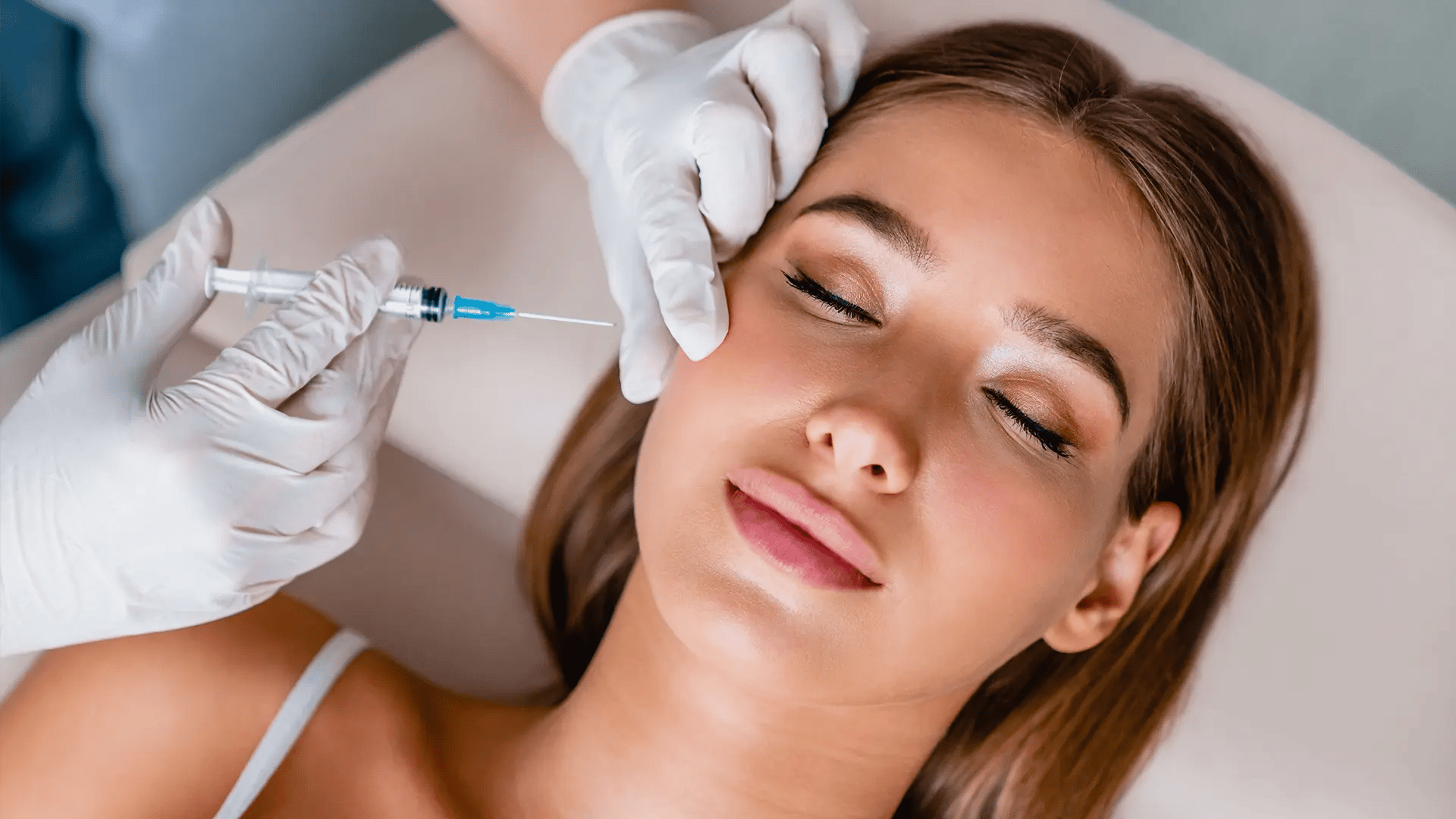 Relaxed woman waiting to get Juvederm applied to her face at Liquivida Wellness Center