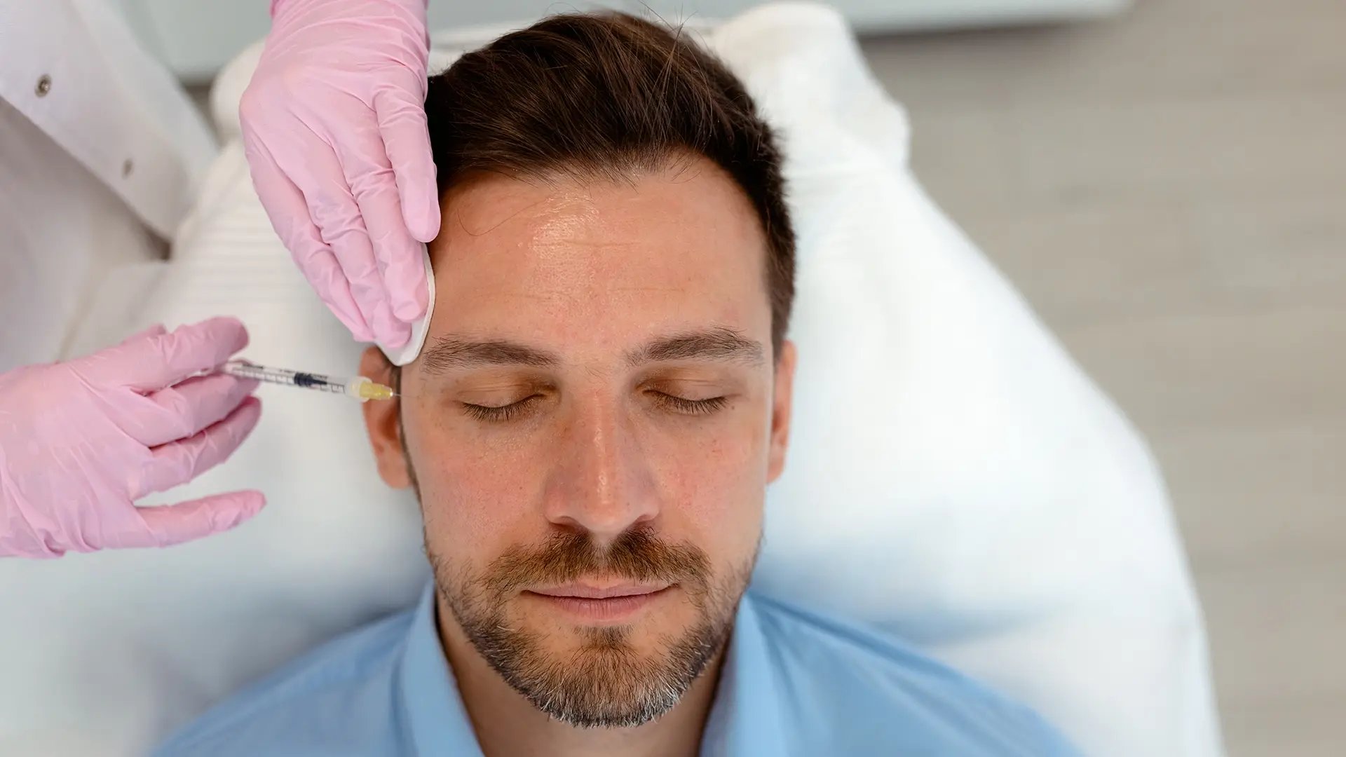 Man getting Xeomin applied to his face at Liquivida Wellness Center