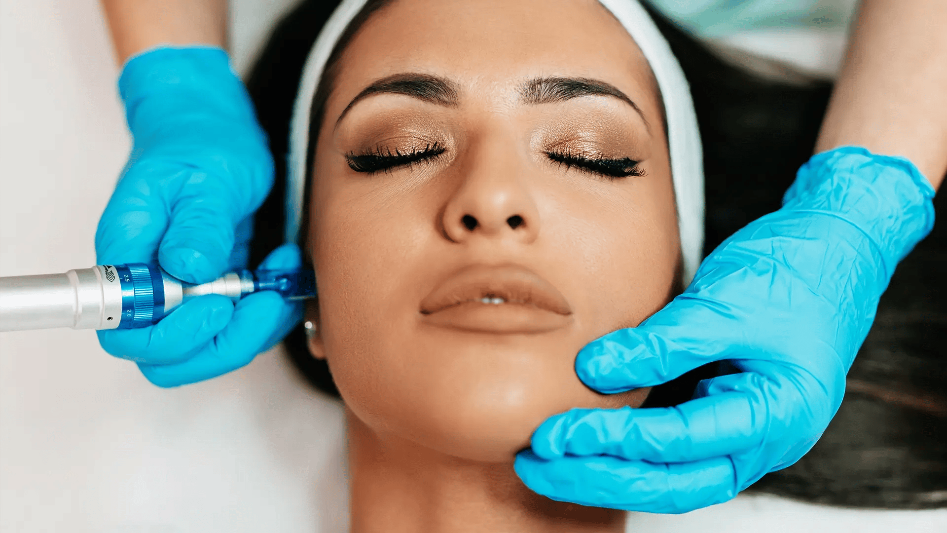 Relaxed woman during a Microneedling session at Liquivida Wellness Center