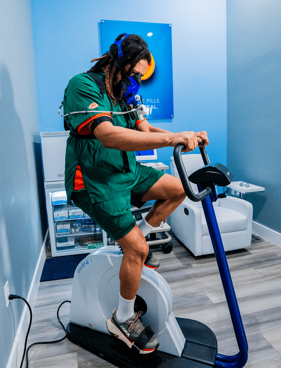 Rohan Marley rides an indoor bike as part of his VO2 Max assessment at Liquivida