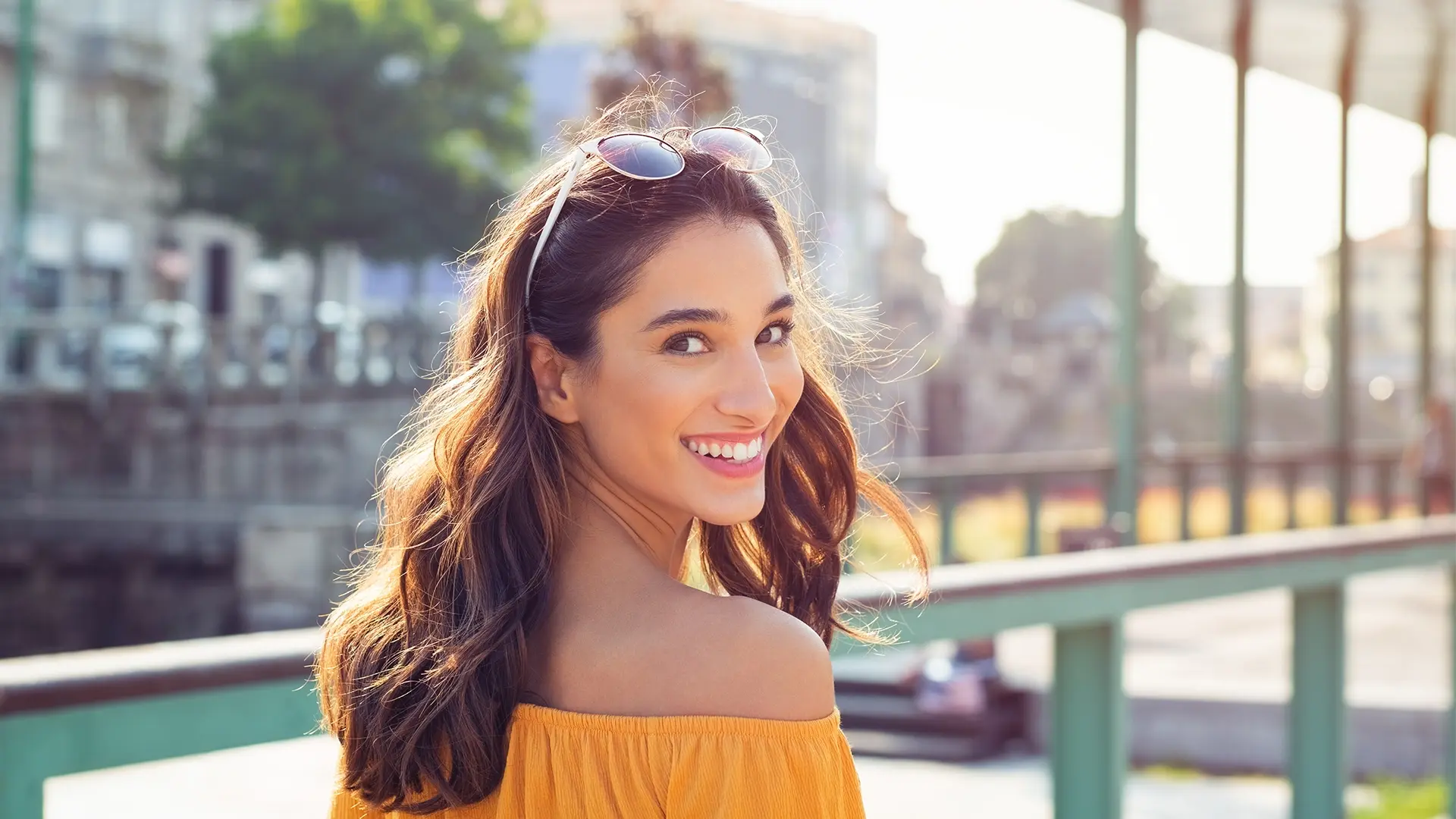 Woman smiles after her glutathione injectios at Liquivida Wellness Center