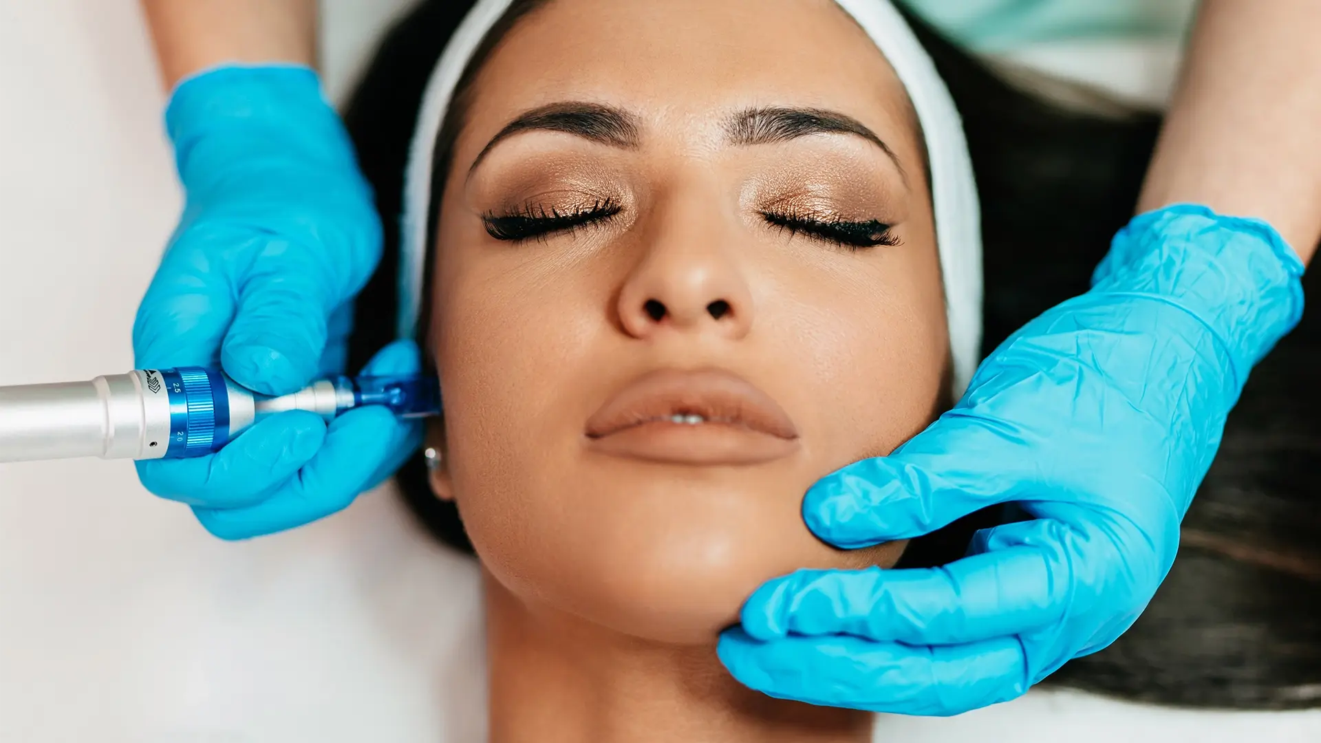 Relaxed woman during a Microneedling session at Liquivida Wellness Center