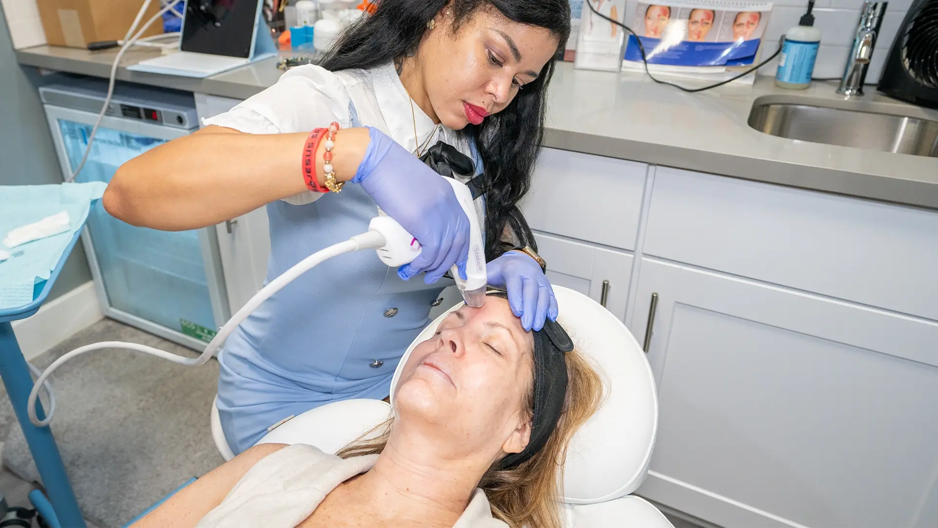 Woman getting a Matrix treatment on her face at Liquivida Wellness Center